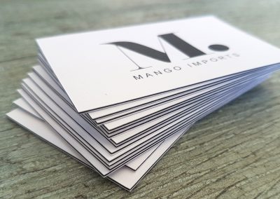Layered business cards with black seam